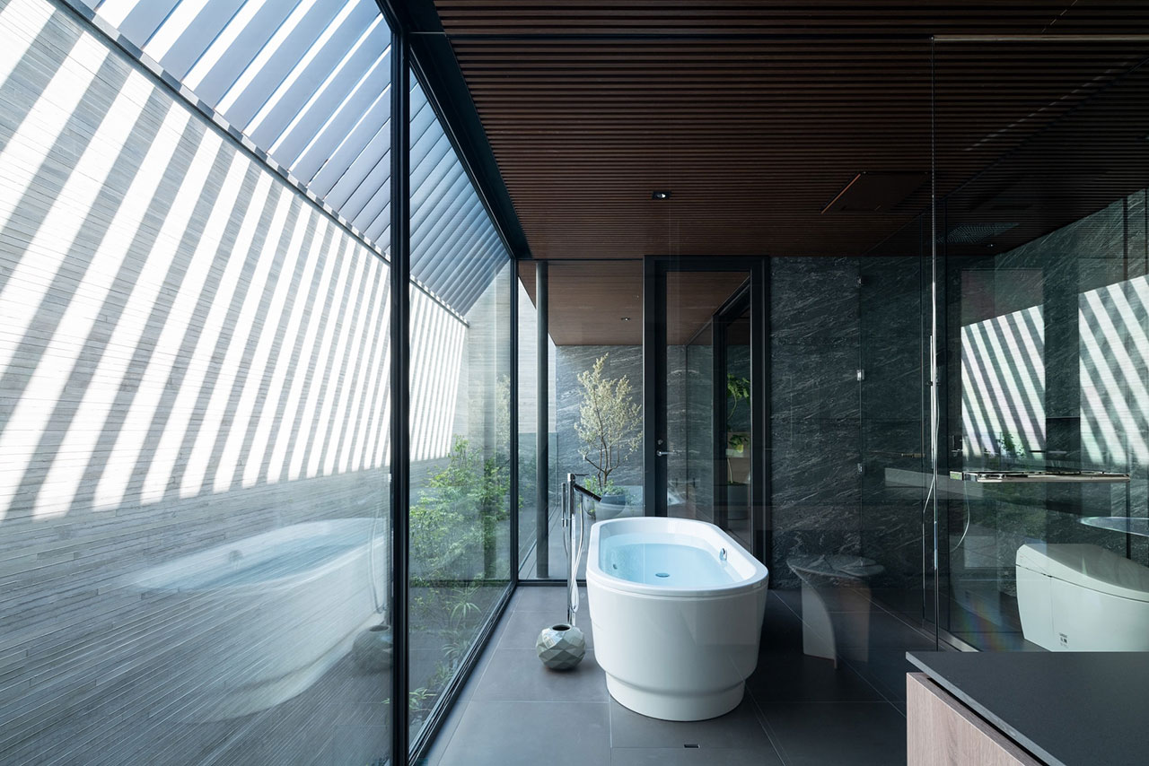 Stealth Is a Resort-Style Home Hidden Behind a Monolithic Facade in Tokyo